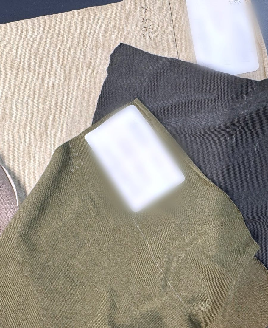 Sports wool fabric swatches on the sampling table